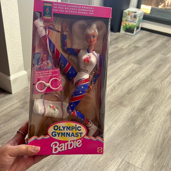 Never opened Authentic Olympic Barbie